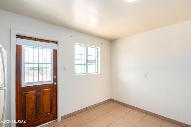 858 W Calle Evelina, Tucson, AZ 85706 - doorway to outside featuring light tile patterned flooring