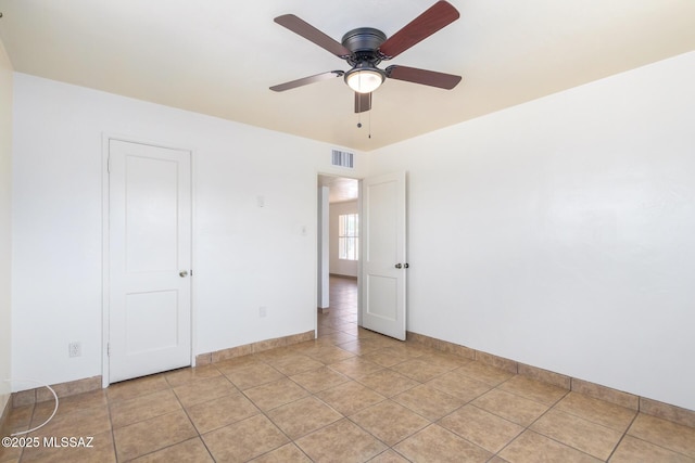 858 W Calle Evelina, Tucson, AZ 85706 - tiled empty room with ceiling fan