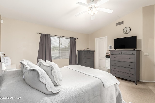 carpeted bedroom with ceiling fan and lofted ceiling