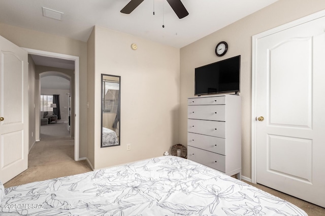 carpeted bedroom featuring ceiling fan