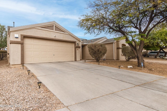 single story home with a garage