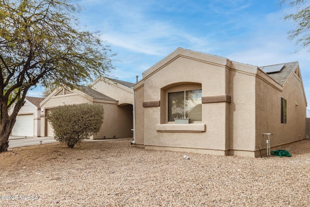 view of front of home featuring a garage