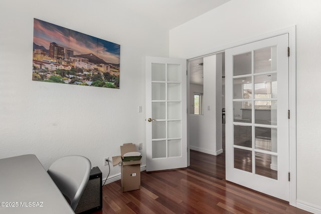 office space featuring french doors and dark hardwood / wood-style floors