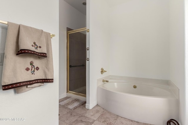 bathroom featuring tile patterned flooring and plus walk in shower