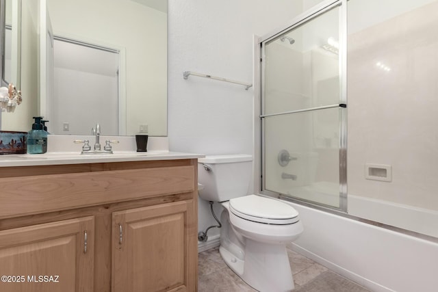 full bathroom with toilet, vanity, and combined bath / shower with glass door