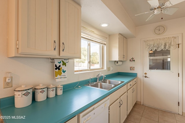 kitchen with white cabinets, dishwasher, light tile patterned floors, ceiling fan, and sink