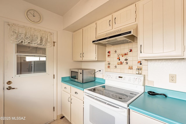 kitchen featuring white cabinets, backsplash, and white electric range