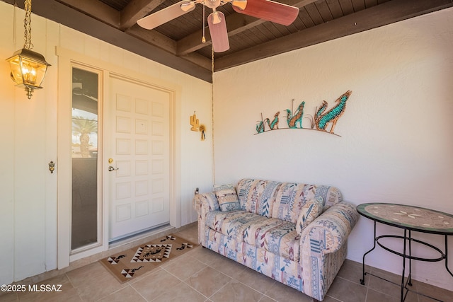 view of exterior entry featuring ceiling fan