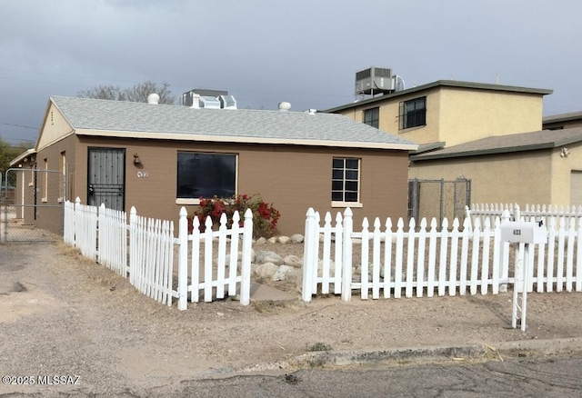 view of front of property with central air condition unit