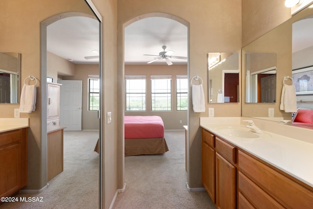 bathroom featuring vanity and ceiling fan