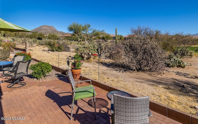 view of patio featuring a mountain view