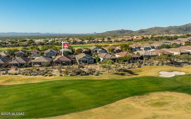 birds eye view of property featuring a mountain view