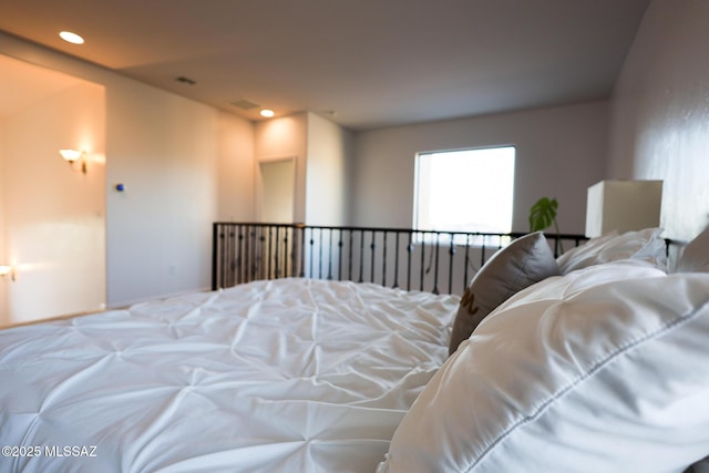 bedroom featuring recessed lighting