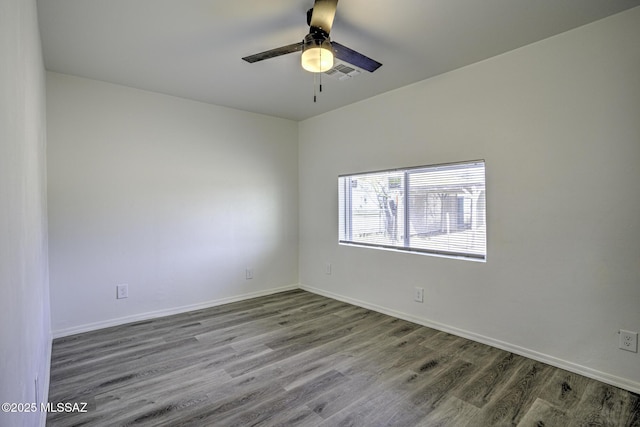 empty room featuring ceiling fan and wood-type flooring