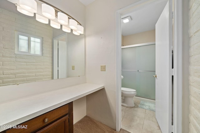 bathroom featuring tile patterned floors, toilet, and walk in shower