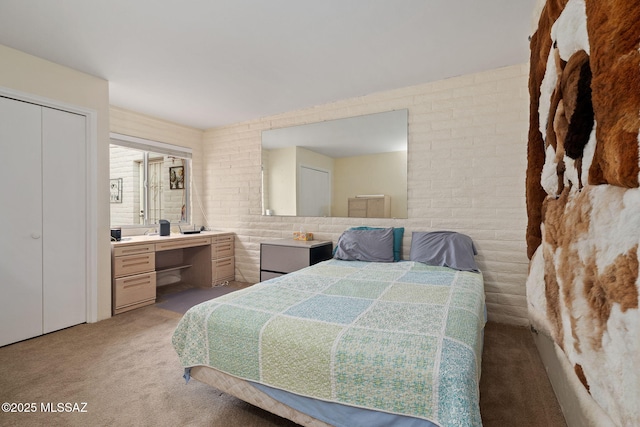 carpeted bedroom with a closet