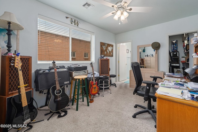 office area featuring light colored carpet and ceiling fan