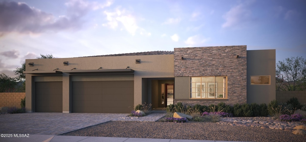 view of front of home featuring a garage