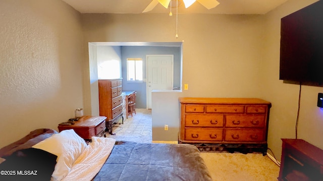 bedroom with carpet and ceiling fan