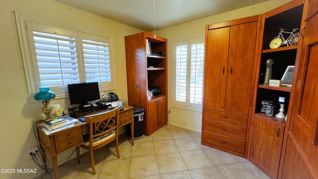 office space featuring light tile patterned flooring