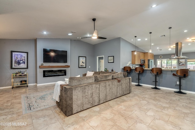 living room featuring lofted ceiling