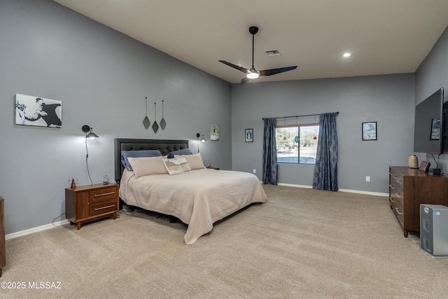 carpeted bedroom featuring ceiling fan and lofted ceiling