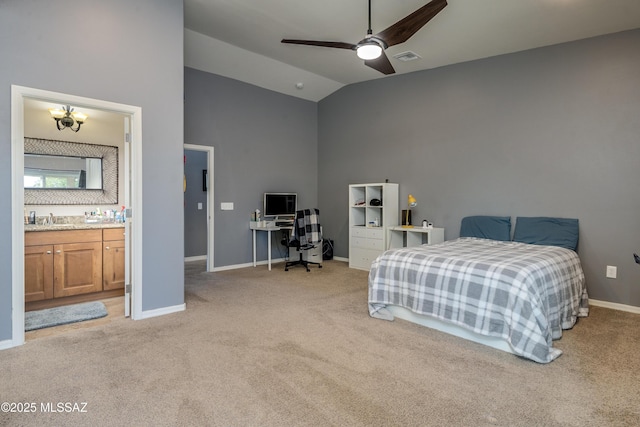 carpeted bedroom featuring ensuite bath, high vaulted ceiling, ceiling fan, and sink