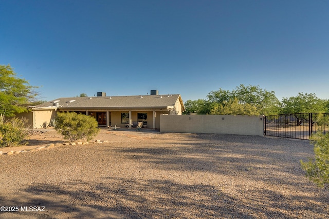 rear view of house featuring a patio area