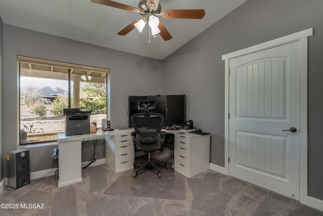 office featuring ceiling fan, vaulted ceiling, and carpet