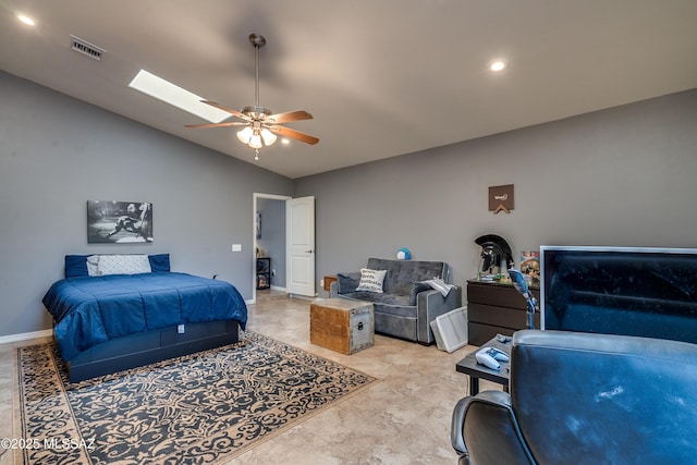 bedroom with ceiling fan and lofted ceiling with skylight