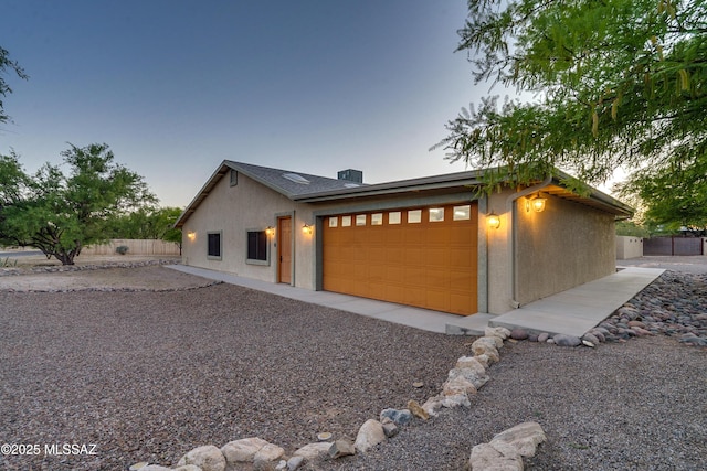 view of front of home featuring a garage