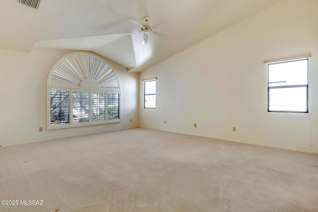 unfurnished room featuring high vaulted ceiling, visible vents, light colored carpet, and a ceiling fan