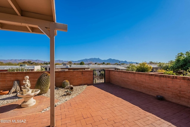 view of patio featuring a mountain view