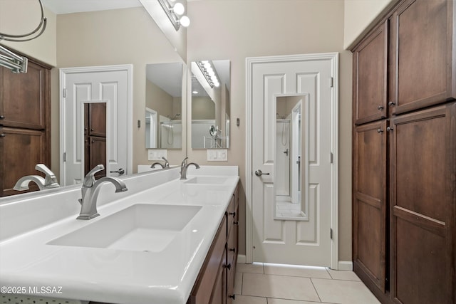 bathroom with vanity and tile patterned floors