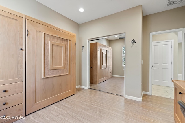 interior space with light hardwood / wood-style flooring