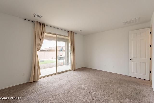 empty room with carpet flooring