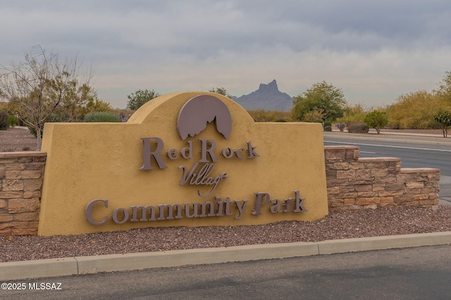 community sign featuring a mountain view