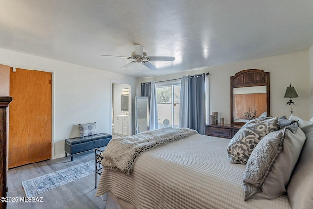 bedroom featuring ceiling fan, wood-type flooring, and connected bathroom