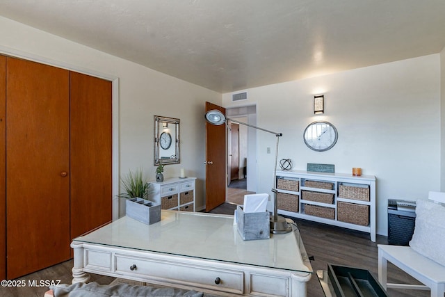 office space featuring dark wood-type flooring