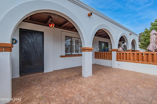 entrance to property with a porch