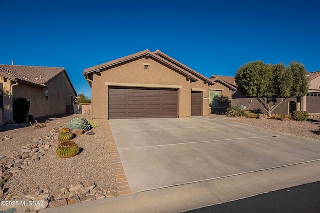 view of front of home with a garage