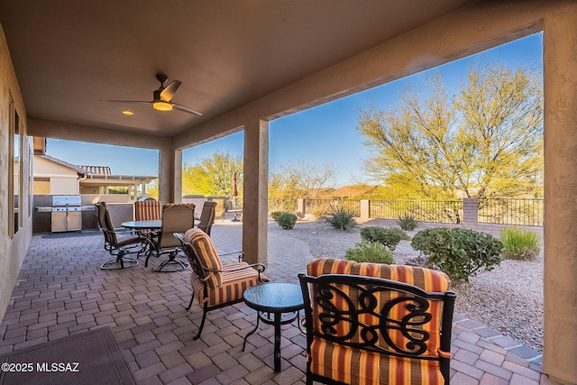 view of patio with ceiling fan