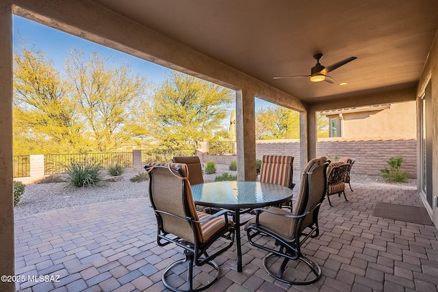 view of patio with ceiling fan