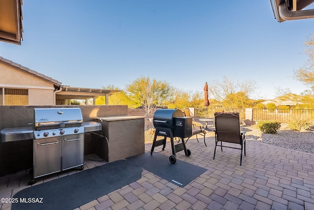 view of patio with area for grilling