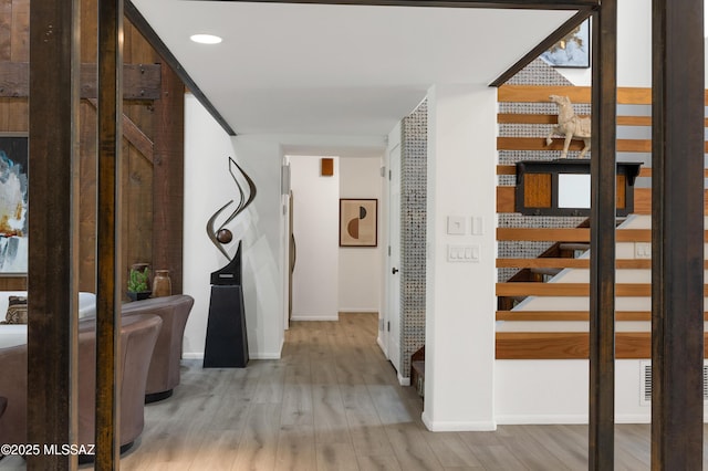 hallway featuring light hardwood / wood-style flooring