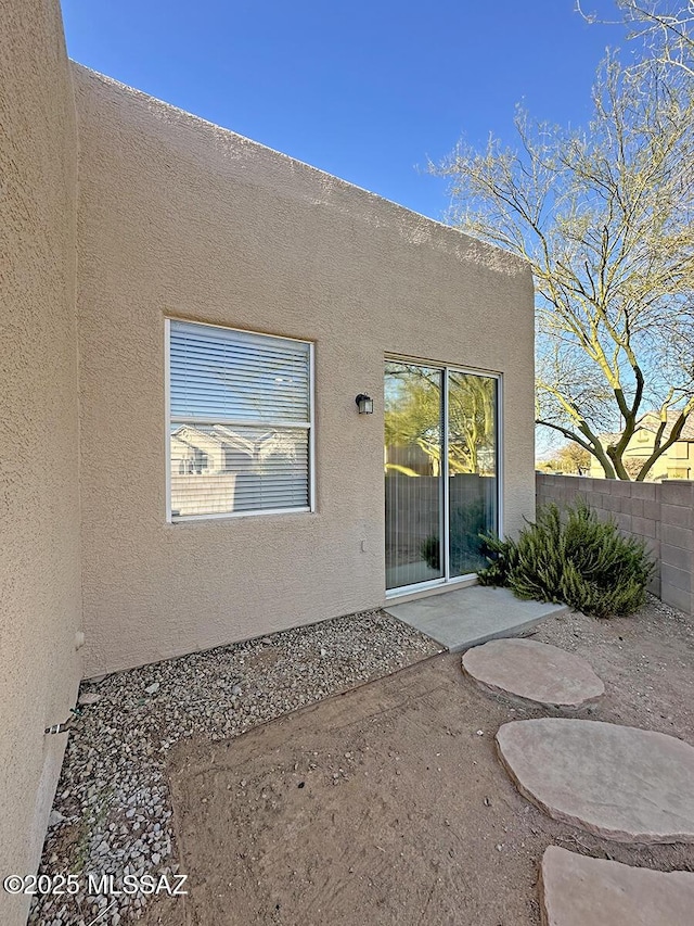 back of property with a patio area