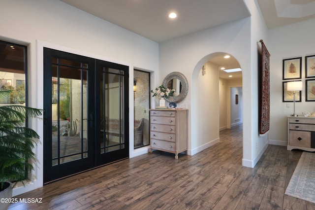 interior space featuring dark wood-type flooring and french doors