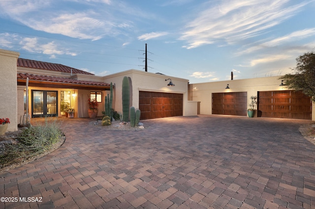 view of front of property featuring a garage