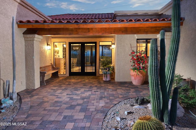 doorway to property with french doors