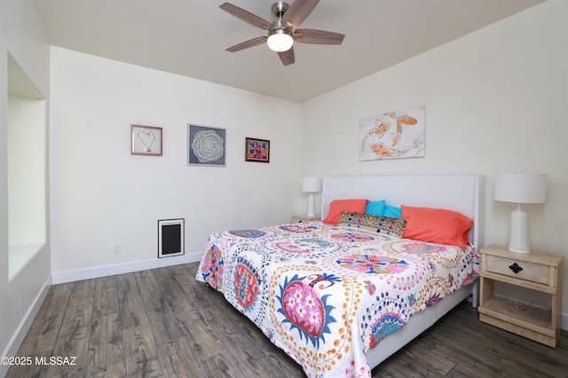 bedroom featuring ceiling fan and dark hardwood / wood-style flooring